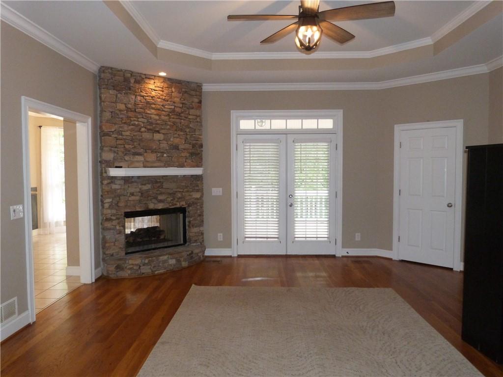 1650 Locklin Cemetery Road Monroe, GA 30655 - Photo 57 of 72 a view of livingroom with window fireplace and window