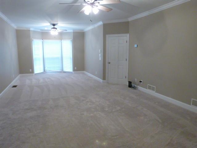 1650 Locklin Cemetery Road Monroe, GA 30655 - Photo 60 of 72 a view of an empty room with a chandelier fan