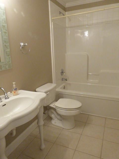 1650 Locklin Cemetery Road Monroe, GA 30655 - Photo 68 of 72 a bathroom with a toilet sink and shower