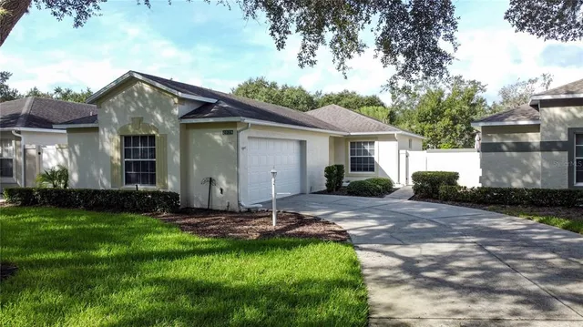 an aerial view of a house with a garden