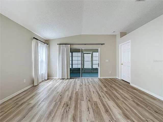 a view of a swimming pool and an outdoor seating