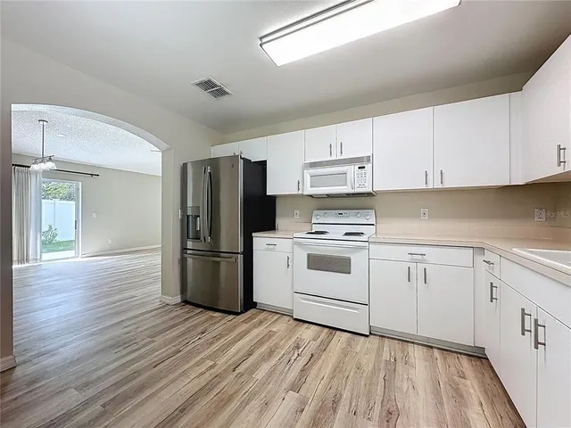 an aerial view of a house with a garden