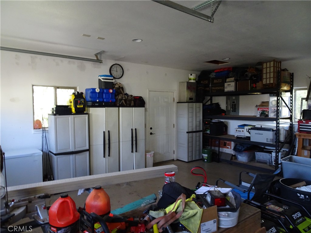 240 Rich Gulch Road Oroville, CA 95965 - Photo 12 of 49 a room with lots of wooden furniture and shower