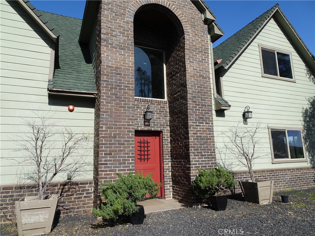 240 Rich Gulch Road Oroville, CA 95965 - Photo 13 of 49 a view of a house with a potted plant