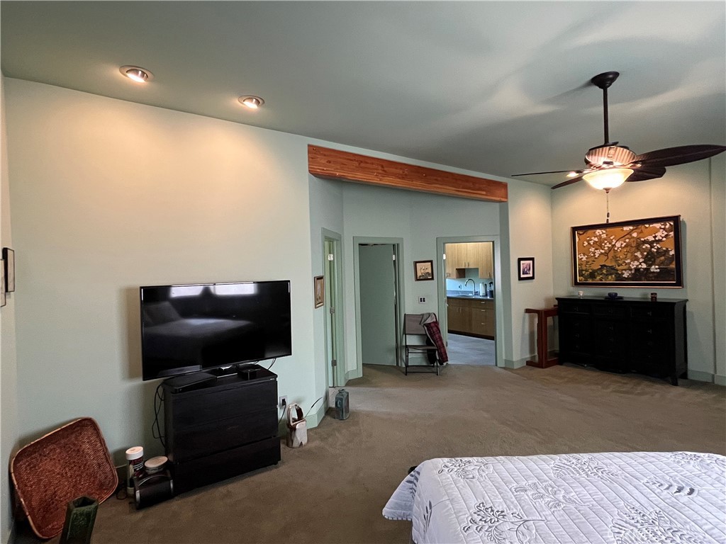 240 Rich Gulch Road Oroville, CA 95965 - Photo 22 of 49 a bedroom with furniture and a flat screen tv