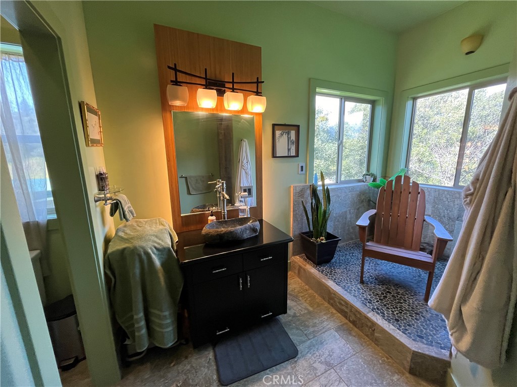 240 Rich Gulch Road Oroville, CA 95965 - Photo 24 of 49 a living room with furniture and a floor to ceiling window