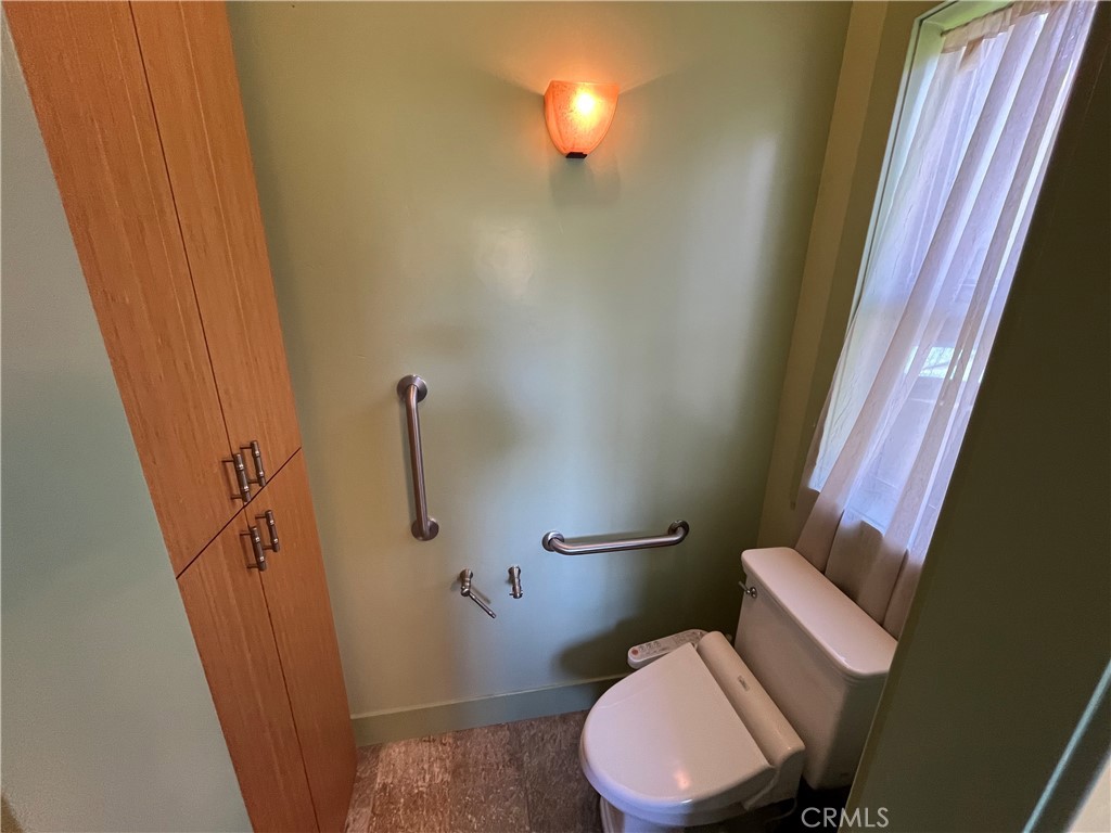 240 Rich Gulch Road Oroville, CA 95965 - Photo 25 of 49 a bathroom with a toilet and a mirror