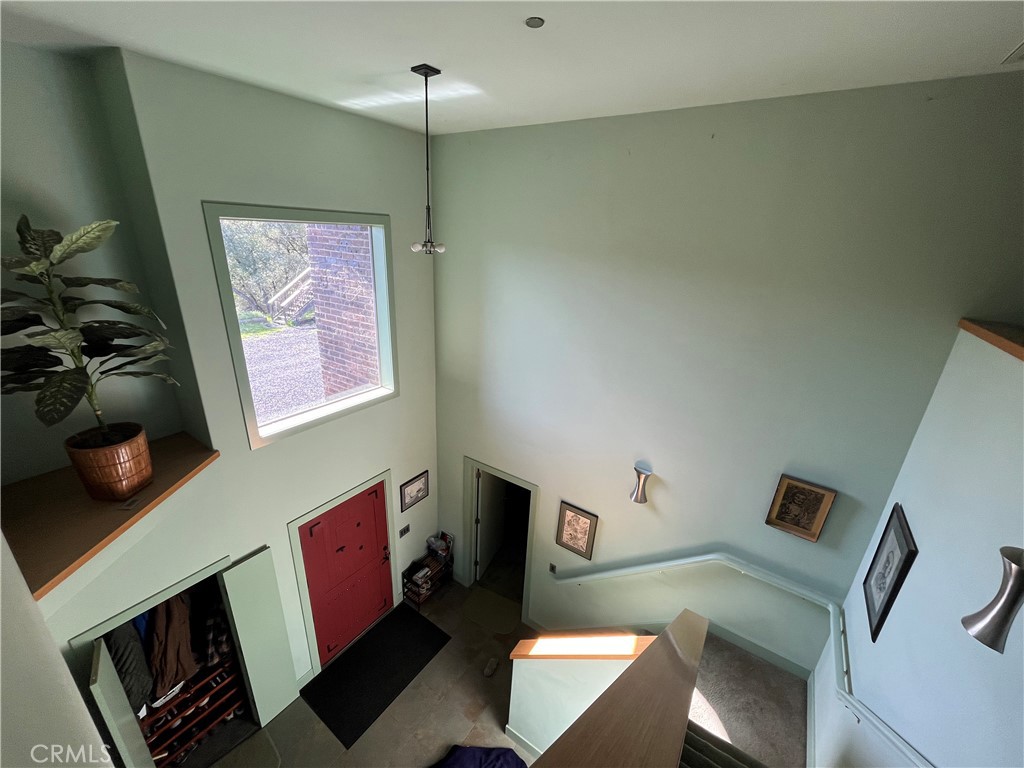 240 Rich Gulch Road Oroville, CA 95965 - Photo 29 of 49 a living room with furniture and a flat screen tv