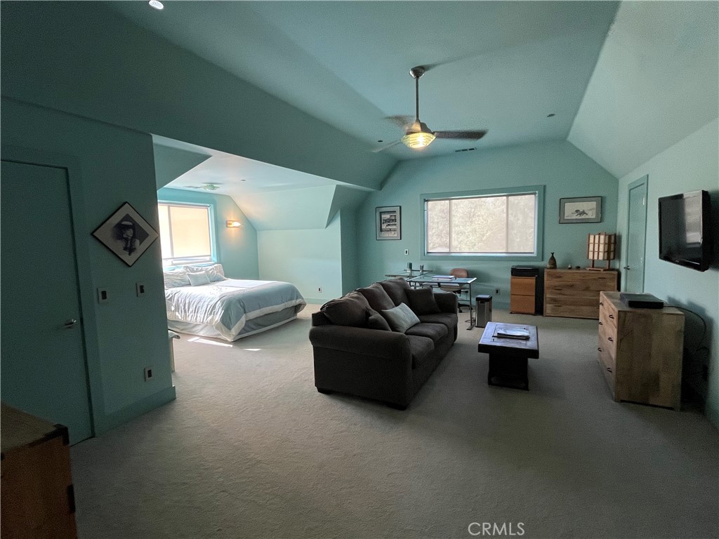 240 Rich Gulch Road Oroville, CA 95965 - Photo 31 of 49 a living room with furniture and a flat screen tv