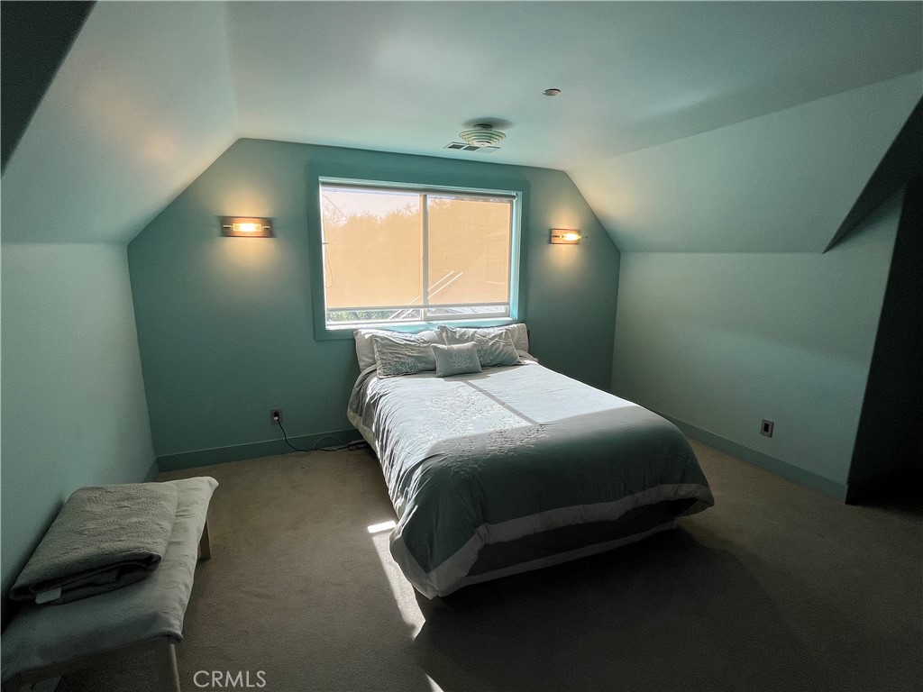 240 Rich Gulch Road Oroville, CA 95965 - Photo 33 of 49 a bedroom with a bed and a window