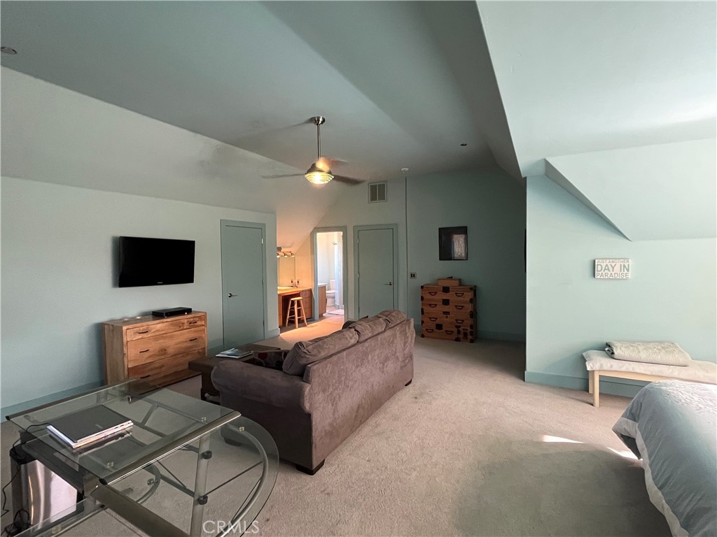 240 Rich Gulch Road Oroville, CA 95965 - Photo 35 of 49 a living room with furniture and a flat screen tv