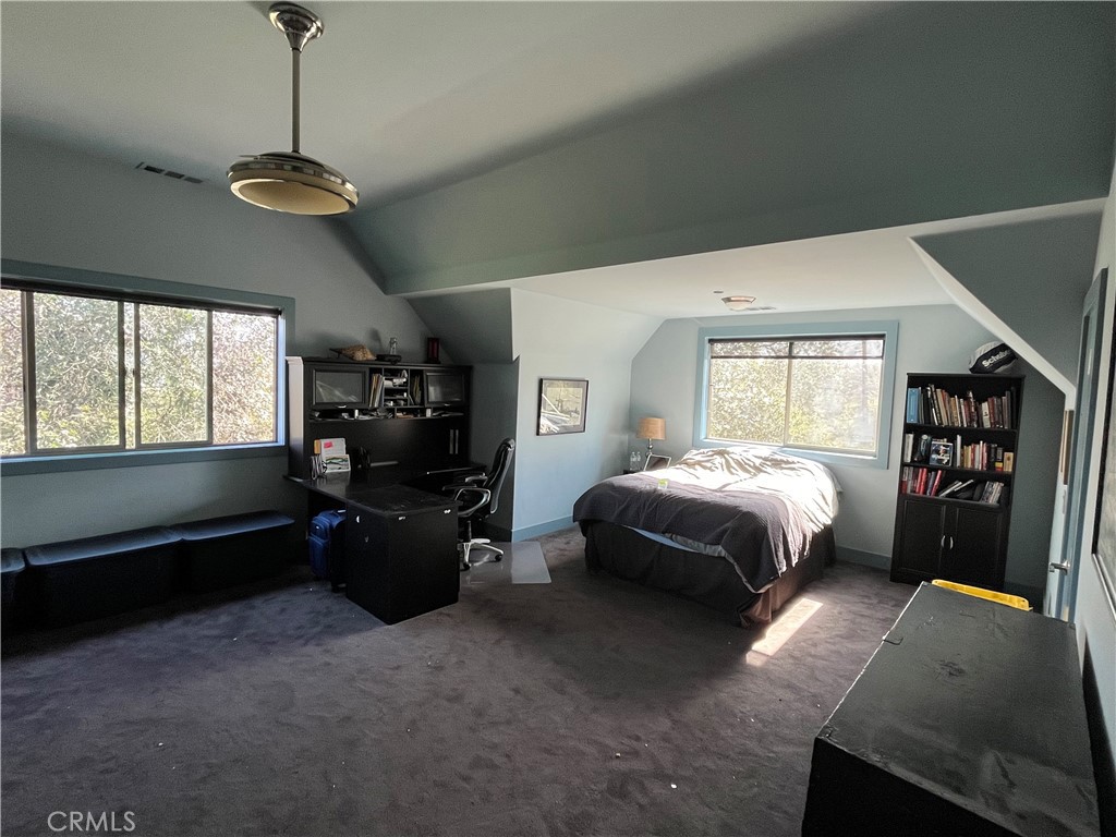 240 Rich Gulch Road Oroville, CA 95965 - Photo 38 of 49 a spacious bedroom with a bed and a large window