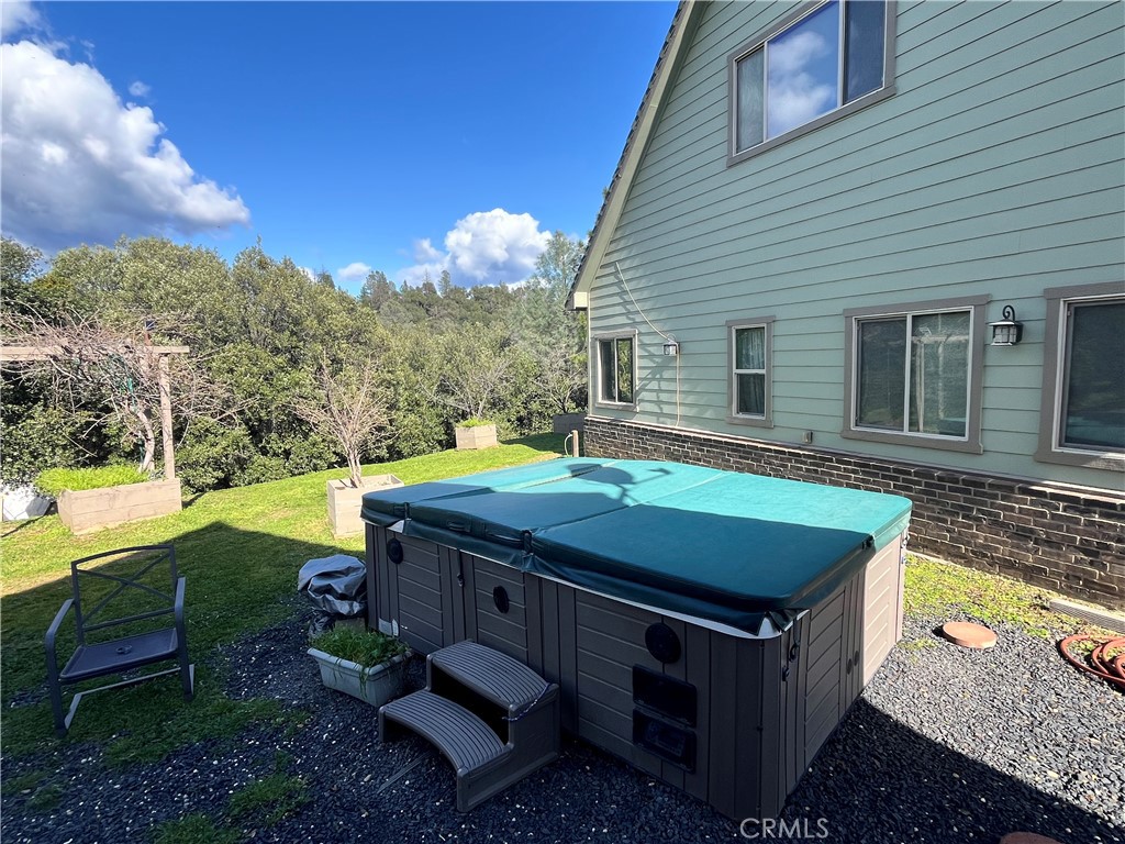 240 Rich Gulch Road Oroville, CA 95965 - Photo 48 of 49 a backyard of a house with yard table and chairs