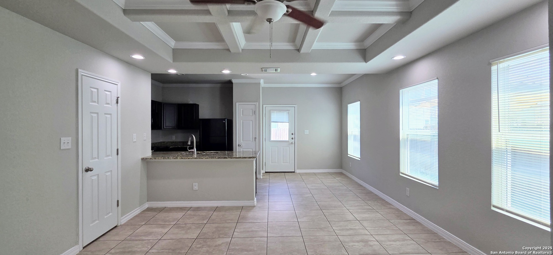 16906 Dancing Ava, Unit 1 Selma, TX 78154 - Photo 2 of 7 a view of a kitchen with a sink and a window