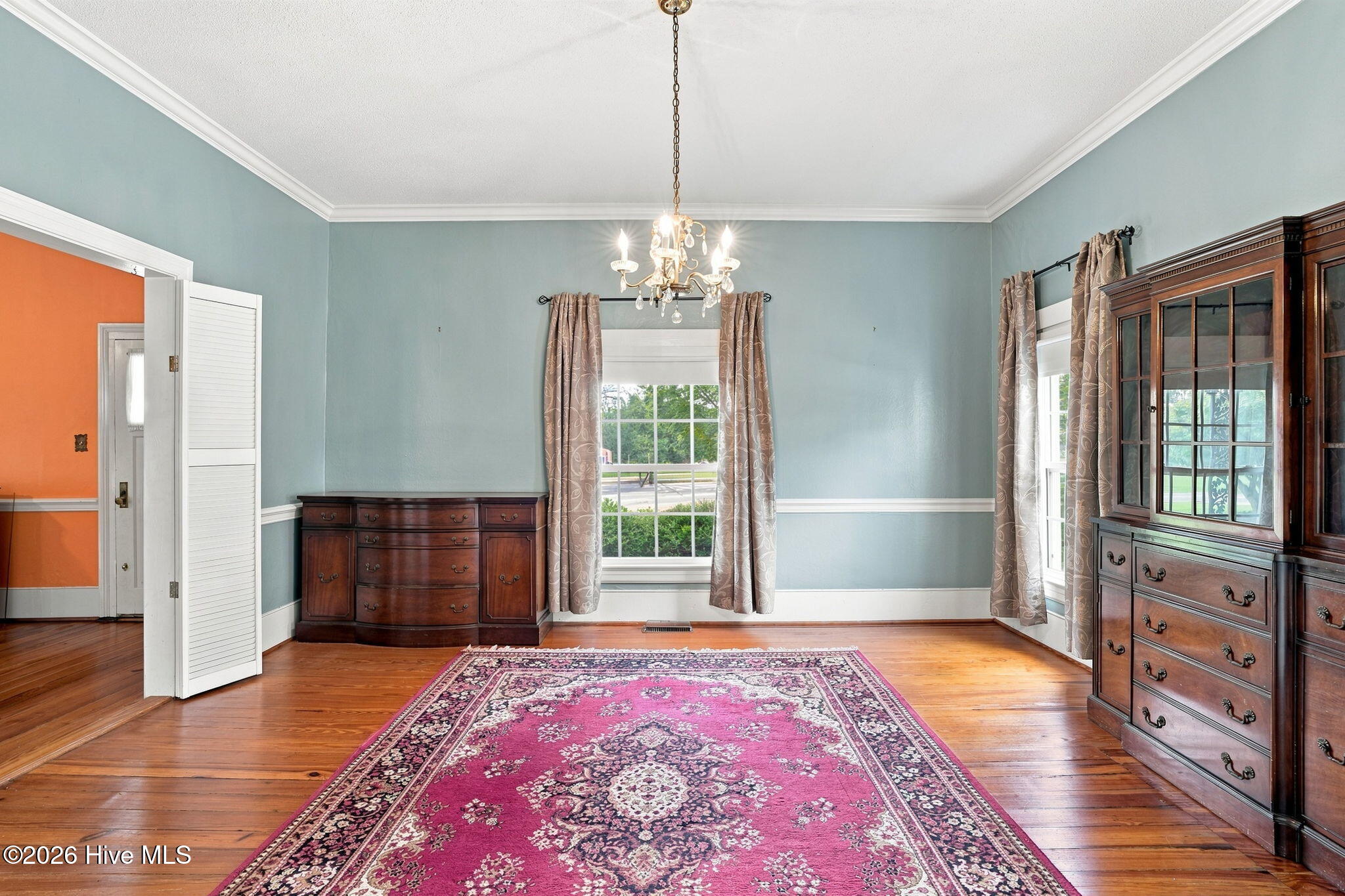 7220 Neal Road Lucama, NC 27851 - Photo 14 of 71 Beautiful hardwoods continue through the formal dining room