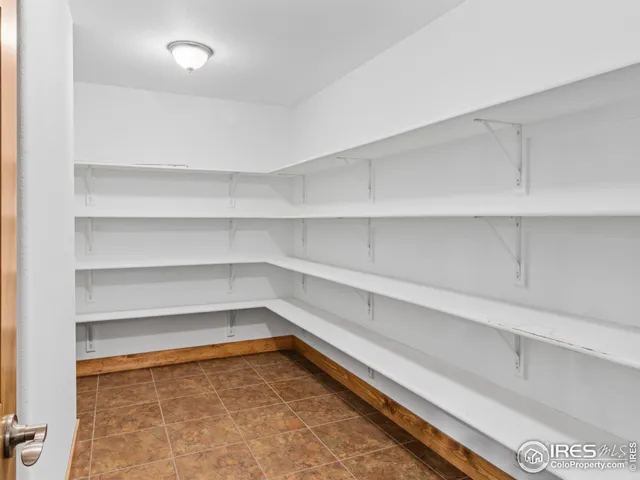 a view of a room with shelves