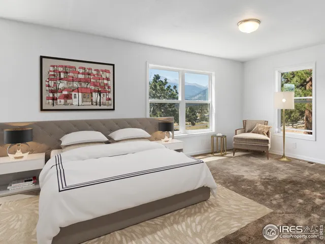 a living room with a couch and a large window