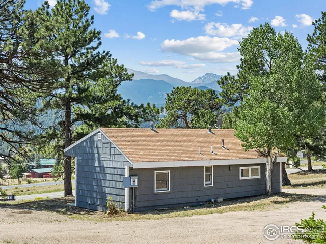 a view of entryway with wooden walls