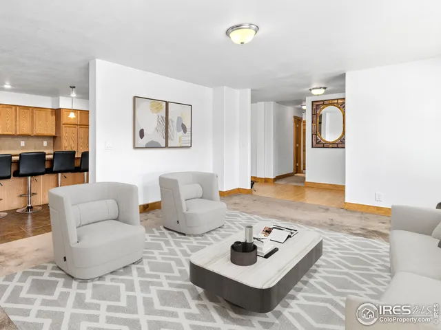 a living room with furniture and a rug