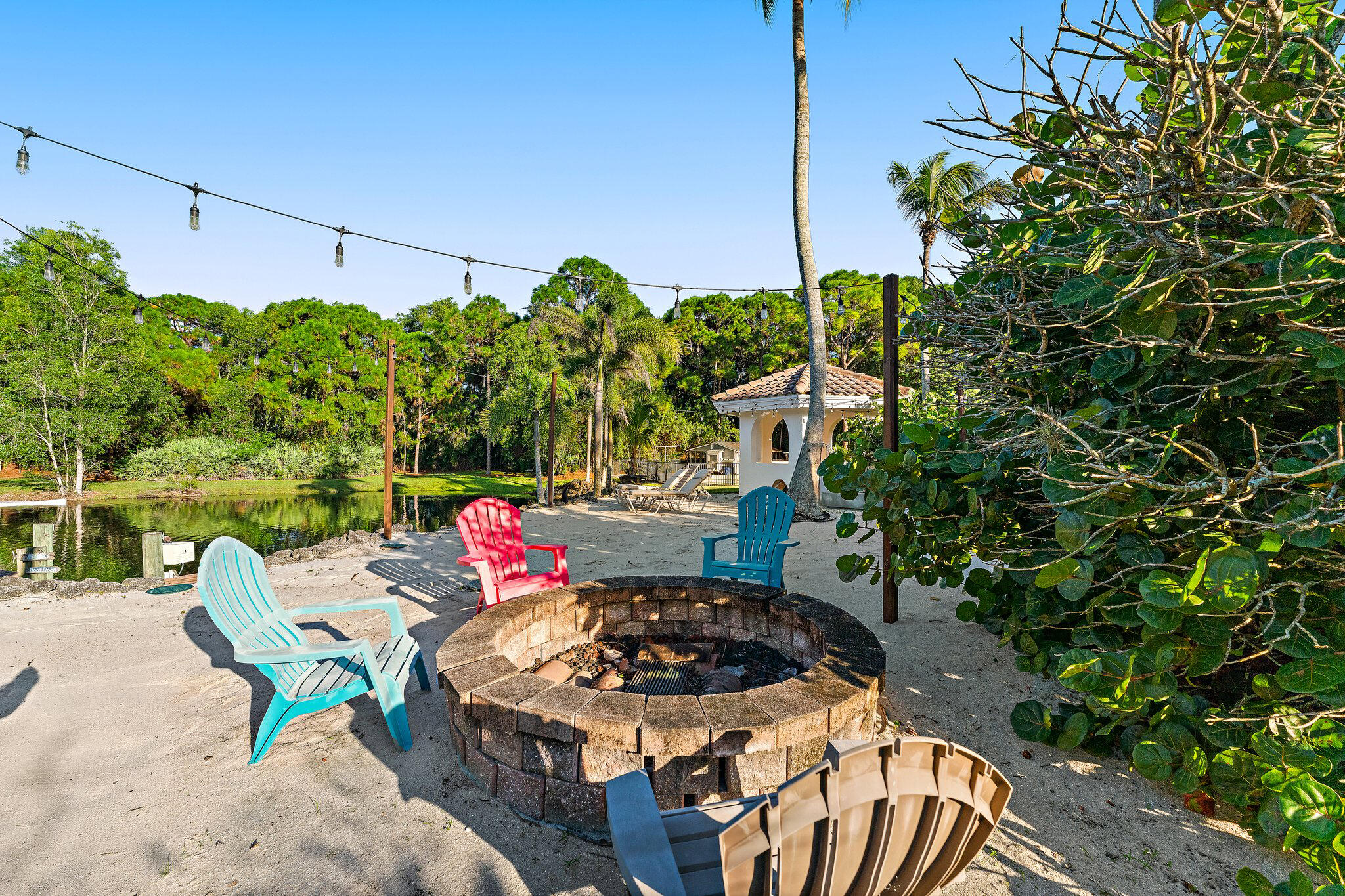 2584 Southeast Ranch Acres Circle Jupiter, FL 33478 - Photo 62 of 83 Fire Pit Lounge