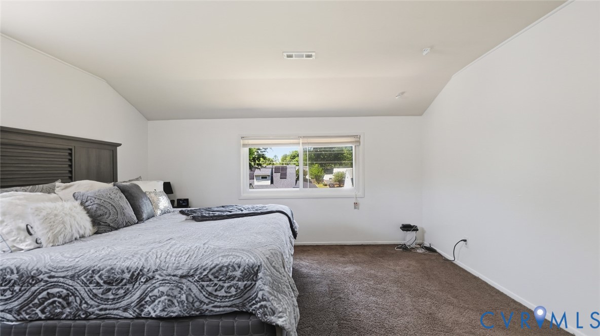 1310 Andover Road Henrico, VA 23229 - Photo 34 of 43 Spacious room with white walls and sloped ceilings