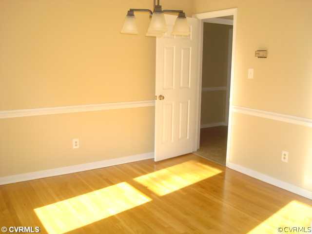 3811 Pebble Creek Road Midlothian, VA 23112 - Photo 3 of 12 a view of a room with wooden floor
