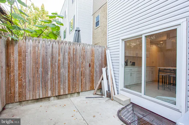 a view of a wooden fence