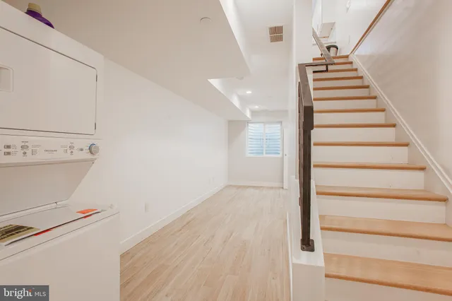 a view of a hallway with staircase