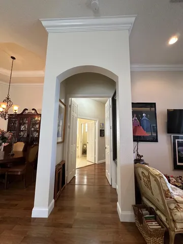 a bathroom with a double vanity sink mirror and bathtub