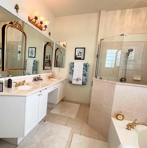 a bathroom with a sink and a shower