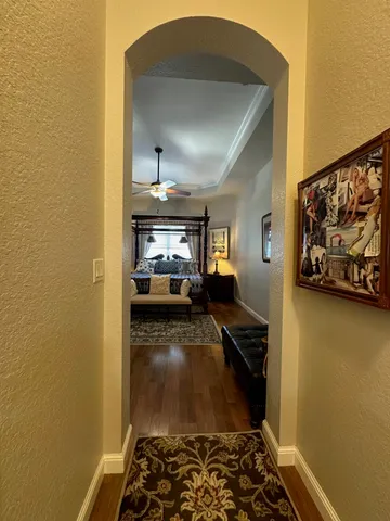 a kitchen with a sink a stove and cabinets