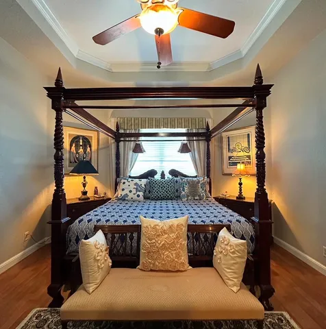 a view of a patio with table and chairs under an umbrella