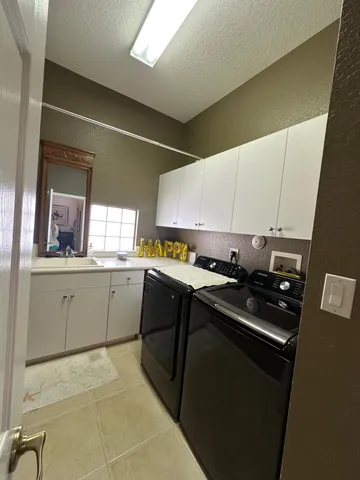 a view of balcony with furniture