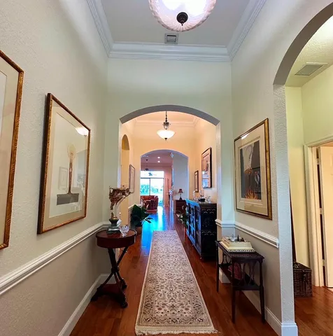 a room with a sink and a mirror