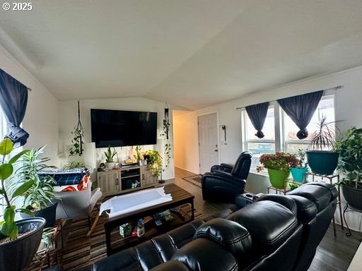 941 Southeast 9th Street Pendleton, OR 97801 - Photo 16 of 36 a living room with furniture and a flat screen tv