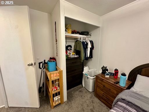 941 Southeast 9th Street Pendleton, OR 97801 - Photo 34 of 36 a view of walk in closet with clothes and shoes