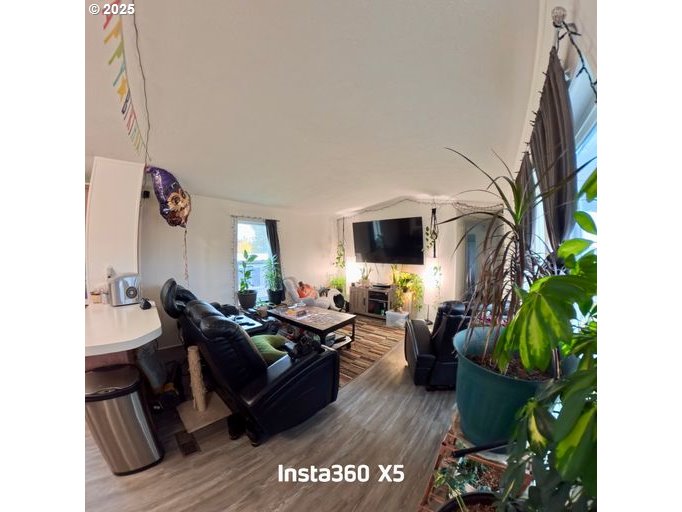 941 Southeast 9th Street Pendleton, OR 97801 - Photo 4 of 36 a living room with furniture and a flat screen tv