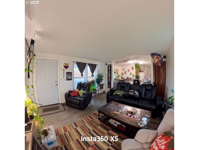 941 Southeast 9th Street Pendleton, OR 97801 - Photo 6 of 36 a living room with furniture and a fireplace
