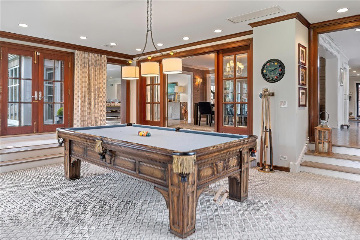 45 Woodley Road Winnetka, IL 60093 - Photo 20 of 61 a room with pool table and windows