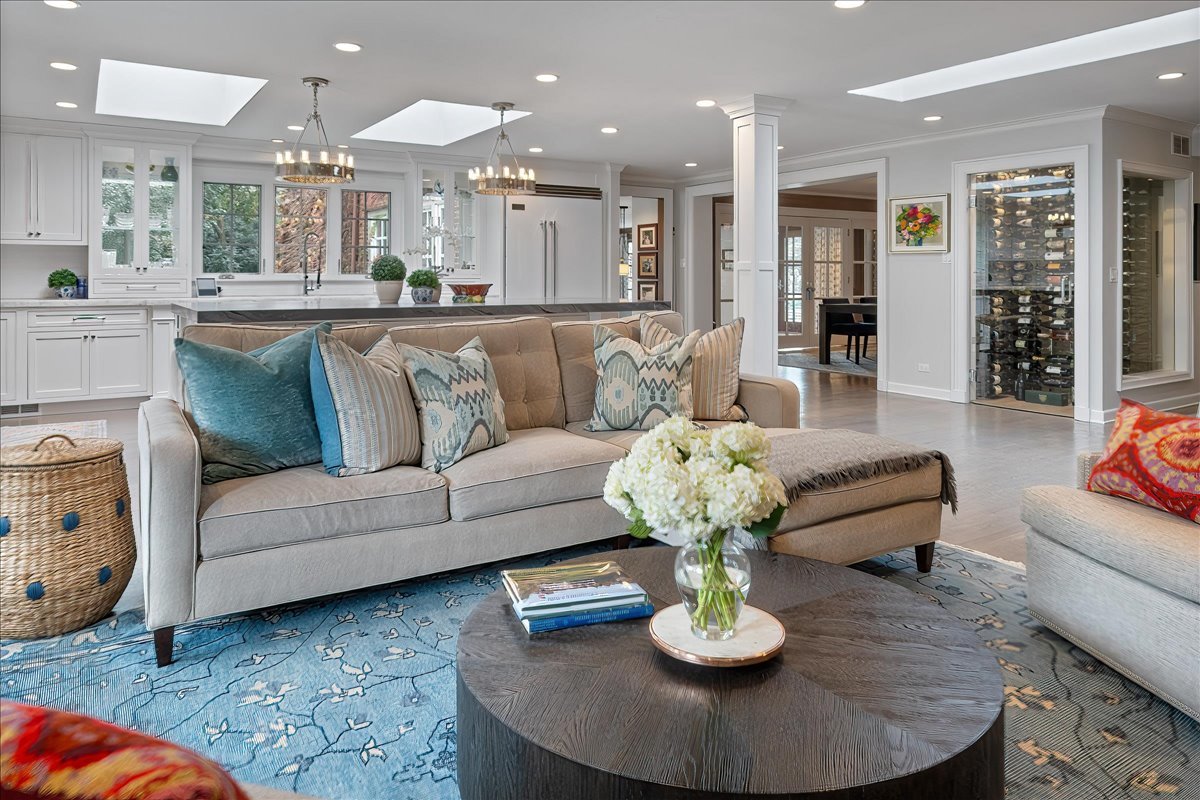 45 Woodley Road Winnetka, IL 60093 - Photo 28 of 61 a living room with furniture kitchen and a chandelier