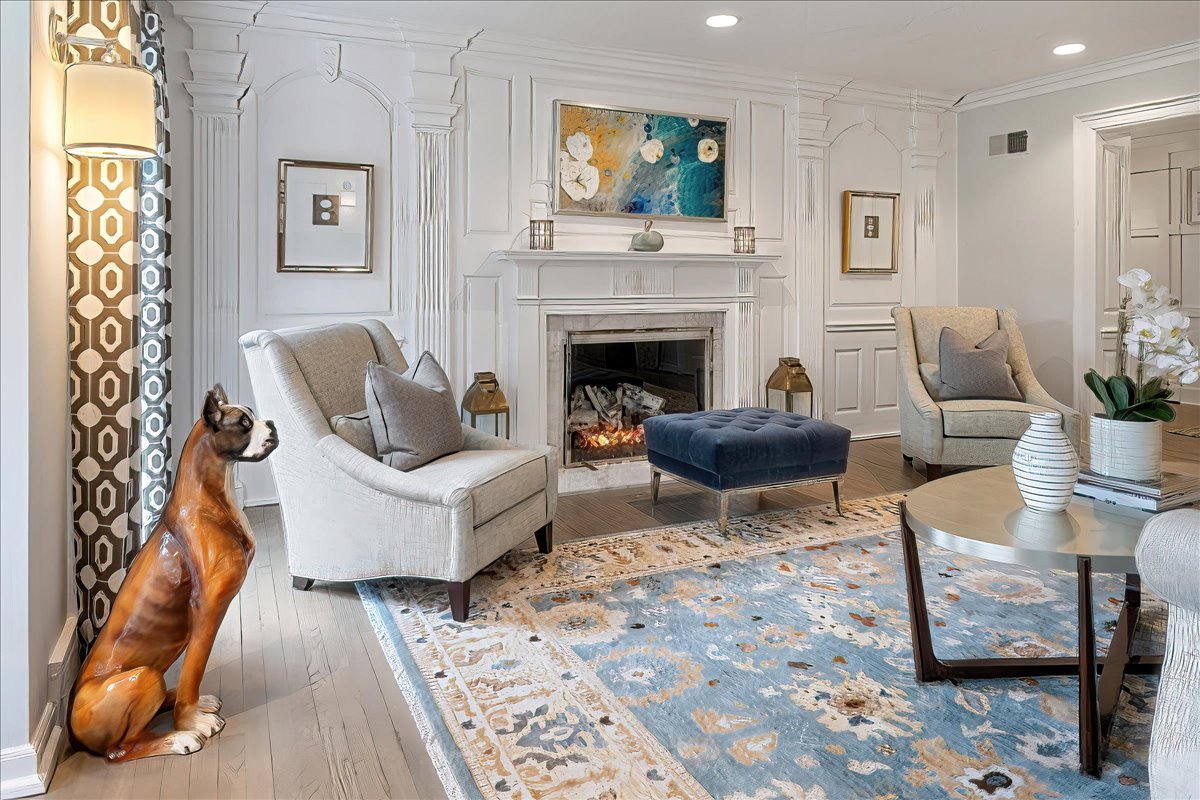 45 Woodley Road Winnetka, IL 60093 - Photo 6 of 61 a living room with furniture and a fireplace