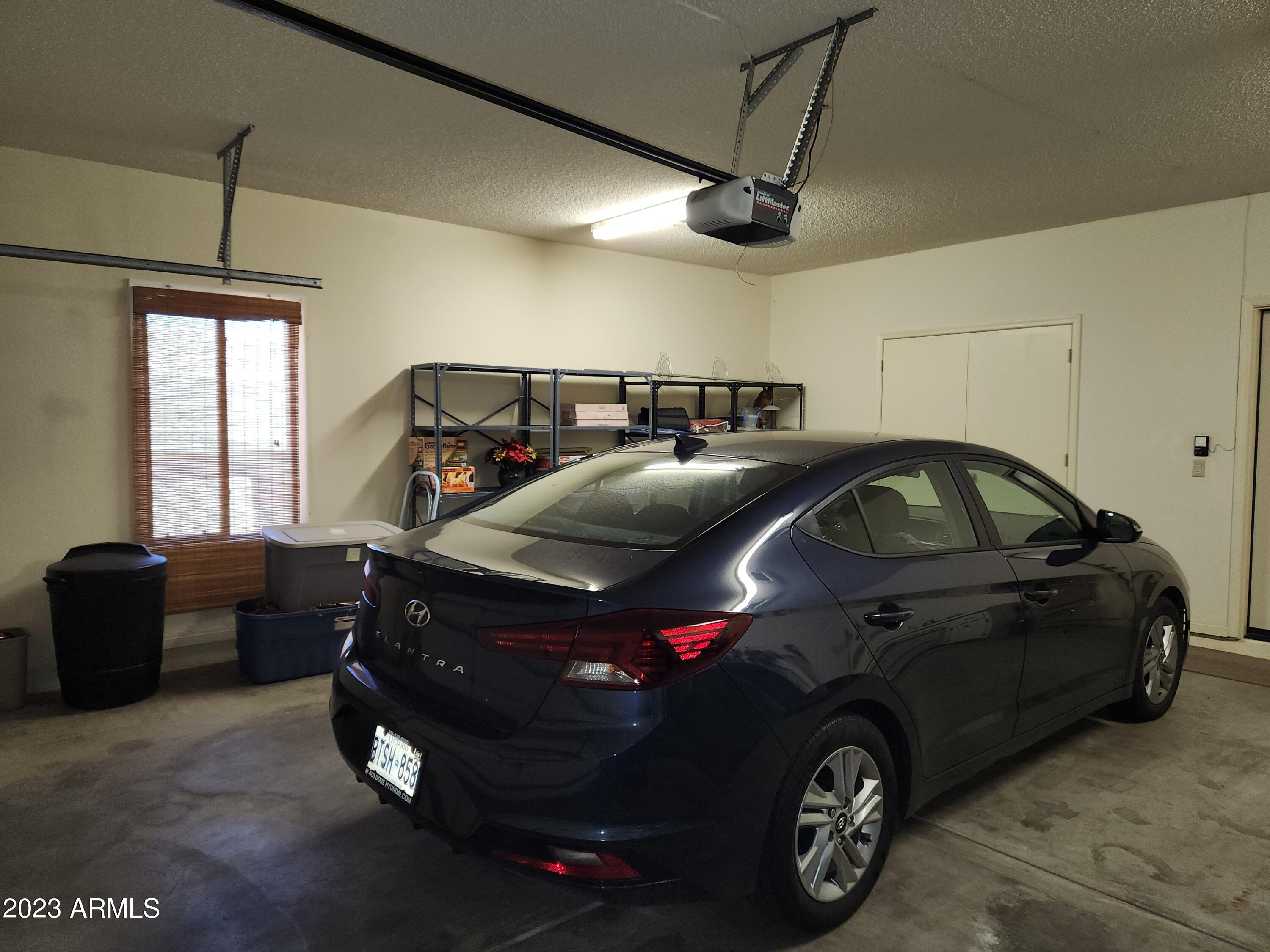 18709 East Avenida Del Ray Rio Verde, AZ 85263 - Photo 31 of 49 AVENIDA DEL RAY GARAGE WITH CAR