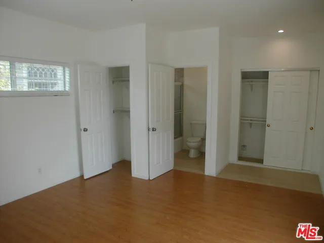 a utility room with sink dryer and washer