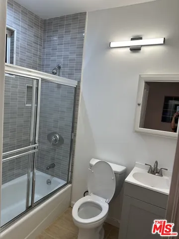 a view of a an empty room with a window