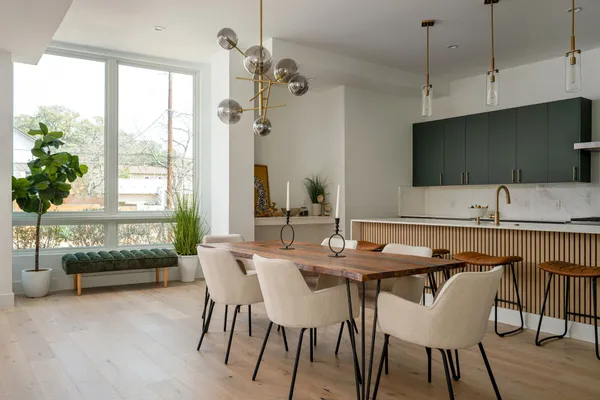 a view of a dining room with furniture window and outside view