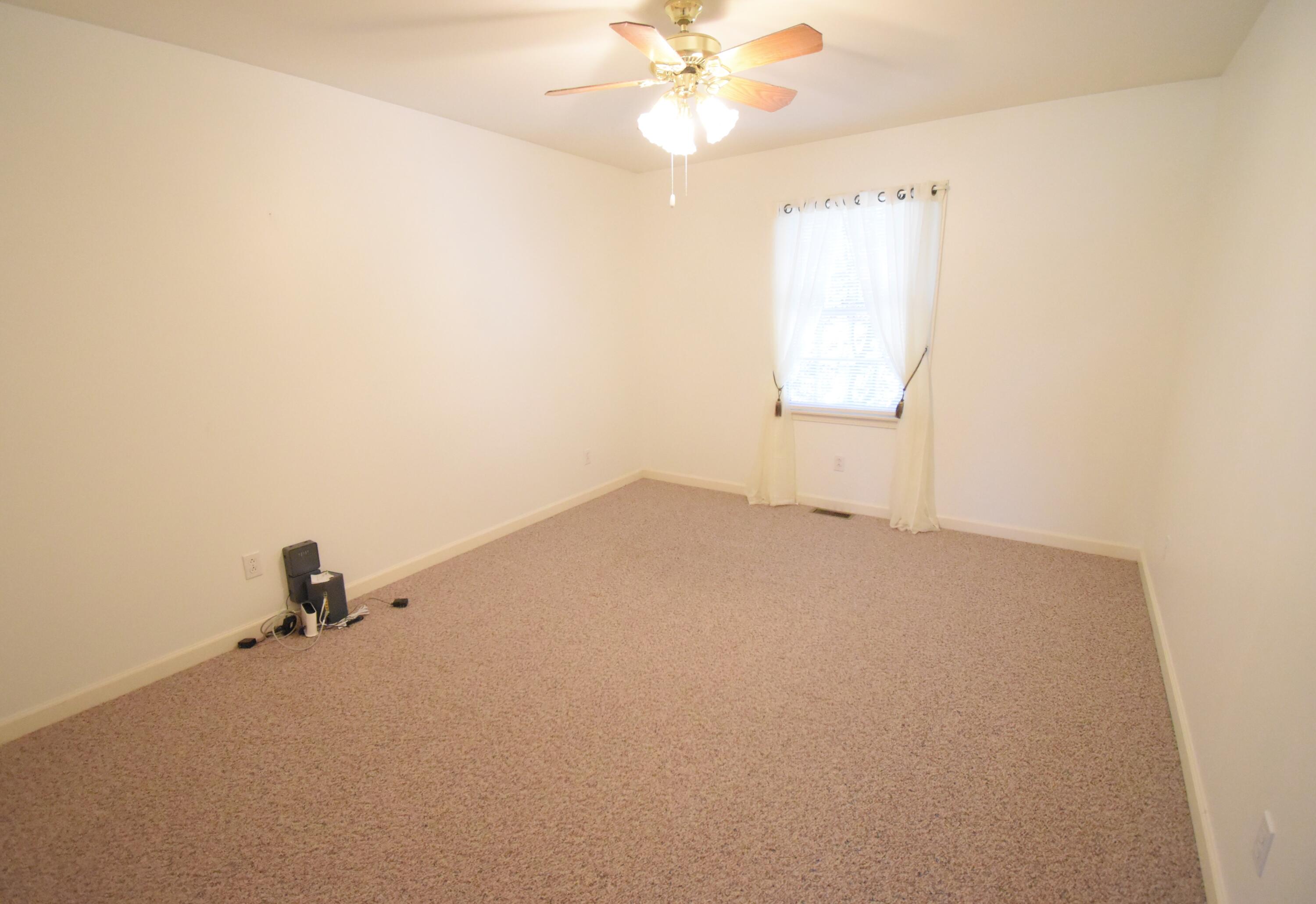 522 Pheasant Run Rensselaer, IN 47978 - Photo 47 of 55 a view of a room with a ceiling fan and a window