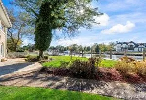 a view of a lake with a big yard