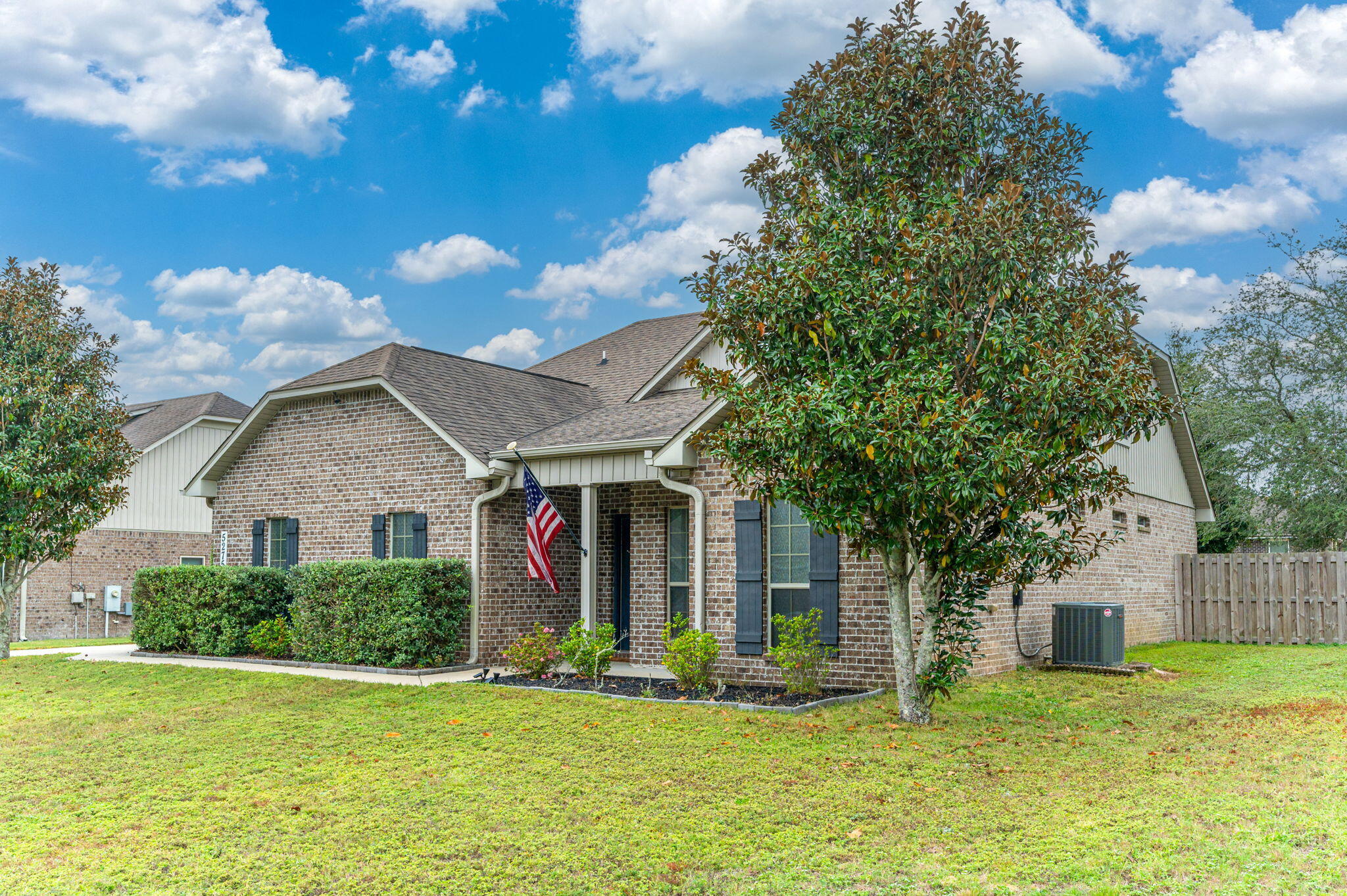 5275 Moore Loop Crestview, FL 32536 - Photo 1 of 32 a front view of house with yard and green space
