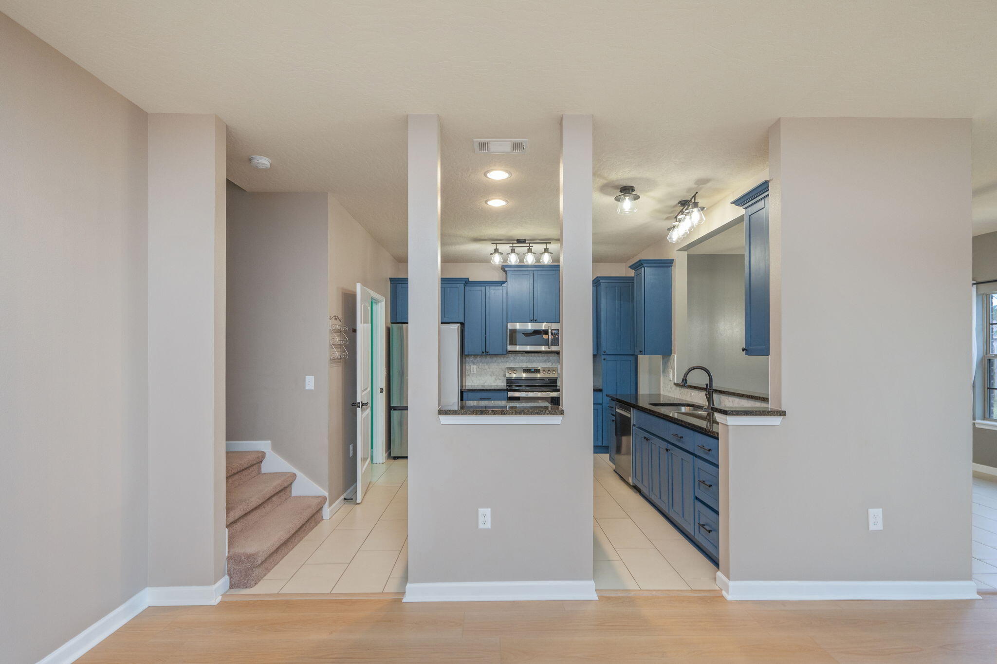 5275 Moore Loop Crestview, FL 32536 - Photo 11 of 32 a kitchen with stainless steel appliances granite countertop a refrigerator and a sink