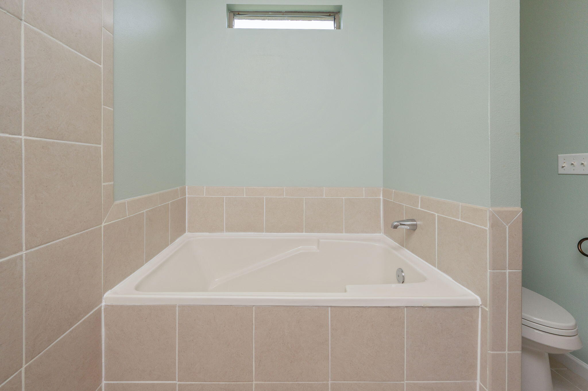 5275 Moore Loop Crestview, FL 32536 - Photo 18 of 32 a white bath tub sitting next to a white toilet